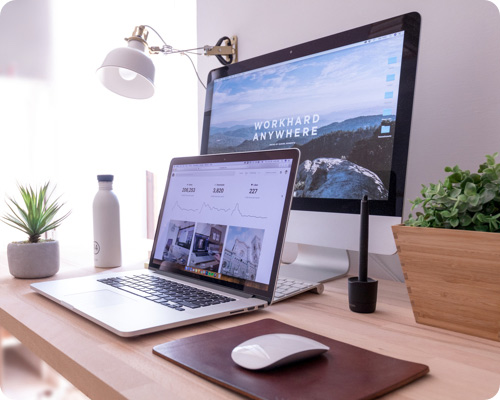 Monitor and laptop on a desk