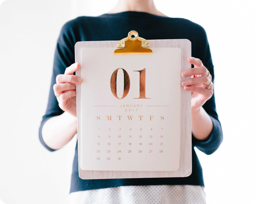 Lady holding a calendar