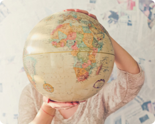 Lady holding a globe