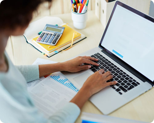 Lady on her laptop on a desk