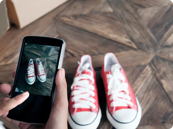 Taking a photo of trainers to sell on eBay